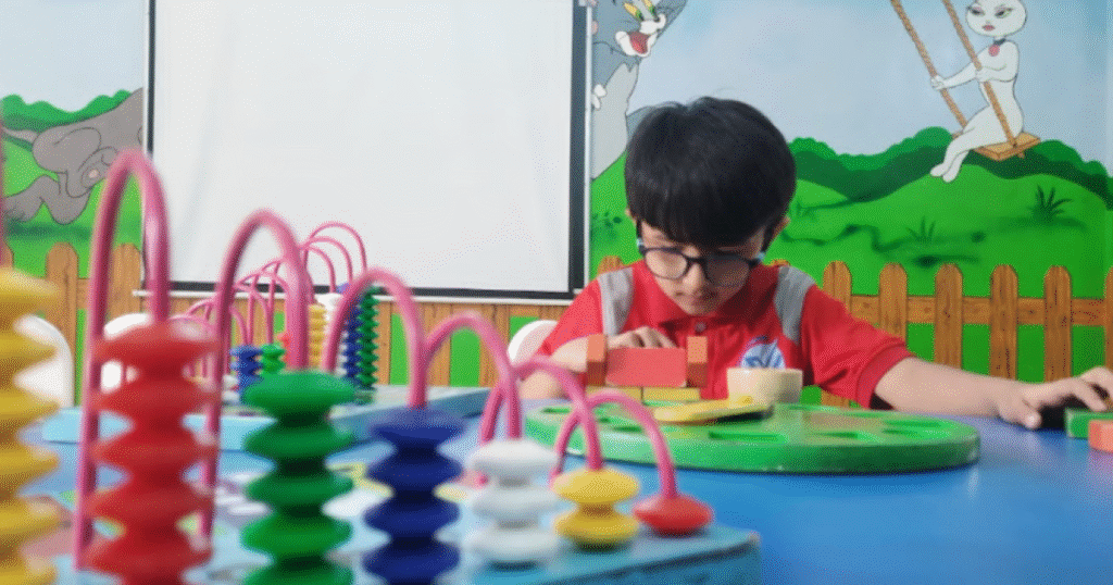 Children doing creative art activities at Akshaya Bala Kuteera preschool in Bangalore for early childhood education.